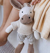 Cedric the Donkey by and the little dog laughed