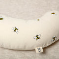 Made from a supportive wooden lining and a washable cotton cover with bees printed on it. The Bee tummy time support aid helps newborn babies during their floor time.