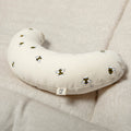 The Bee tummy time support aid is made from a supportive wooden lining and a washable cotton cover which helps newborn babies during their floor time.