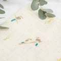 Organic cotton large muslin swaddle wrap in Australian native Kookaburra bird print – GOTS certified double gauze – newborn baby gift – baby essentials – Babu – close up with eucalyptus