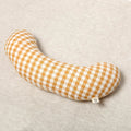 Sewn in a mustard check cotton fabric, and filled with the signature cloud filling,  The Sonny Tummy Time support aid is an excellent accessory for baby's floor time during the early months. 